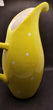 Sloped mouth pitcher